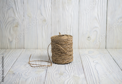 skein of thread on a wooden background