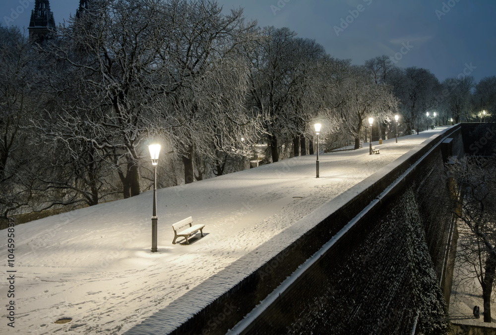 Night scenery of snowy Prague streets Night scenery of snowy Prague streets