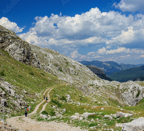 Travelers hiking in the mountains of Montenegro