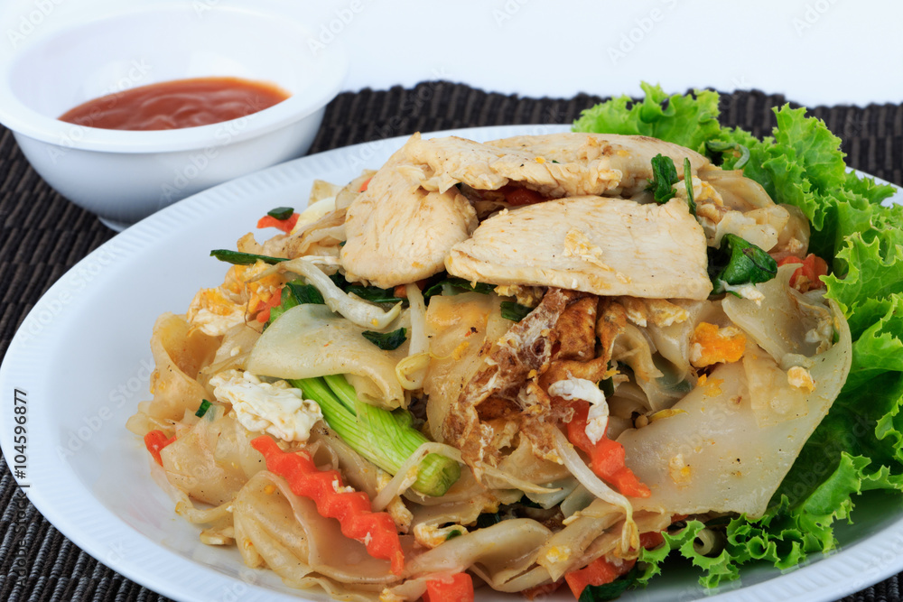 Rice Noodles Stir-fried with Chicken (Guay Tiew Kua Gai), Thai Street Food. Rice Noodles Stir-fried with Chicken (Guay Tiew Kua Gai), Thai Street Food.