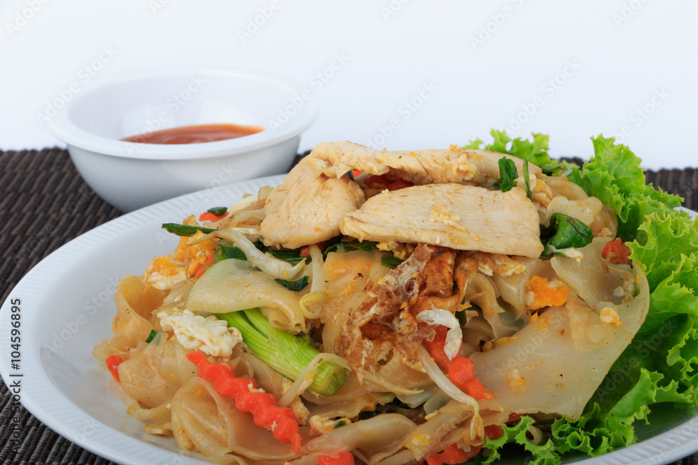 Rice Noodles Stir-fried with Chicken (Guay Tiew Kua Gai), Thai Street Food. Rice Noodles Stir-fried with Chicken (Guay Tiew Kua Gai), Thai Street Food.