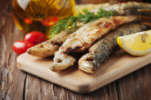 Traditional russian fish smelt on the wooden table