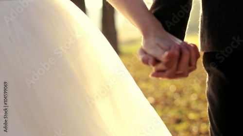 Marry Me Today And Everyday. Newlywed Couple Holding Hands, Shot In Slow Motion