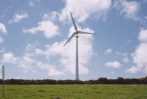 Wind turbine in centre of field