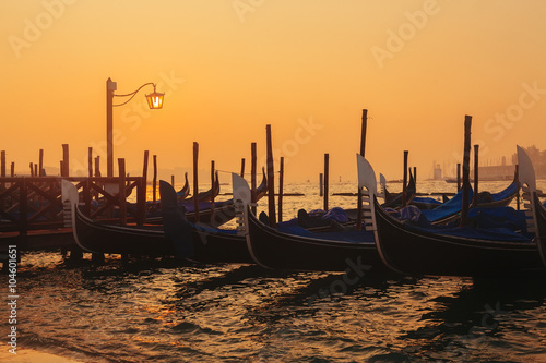 Venetian gondolas at sunrise © aragami
