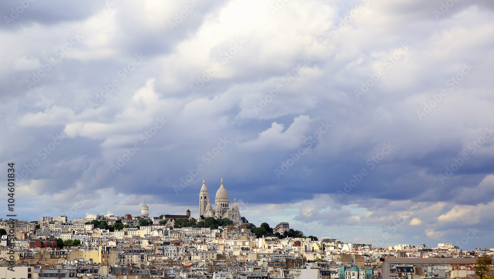 Panoramic rainy sky over Montmartre, in Paris city, France.
