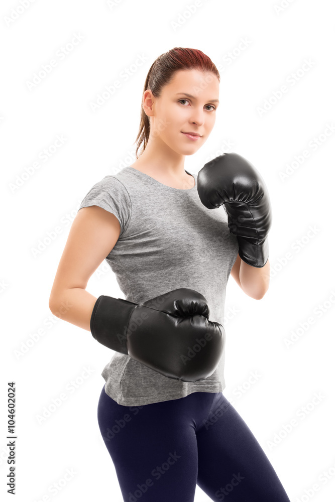 Beautiful young girl with boxing gloves Beautiful young girl with boxing gloves