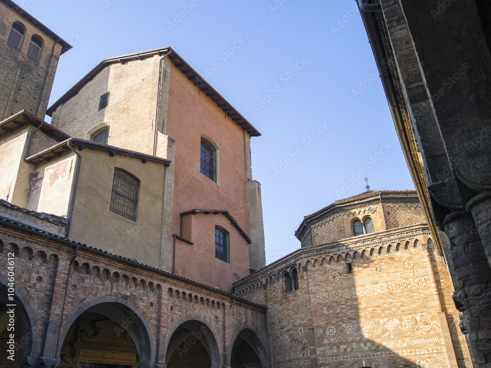 view to wall and dome of old church in Italy