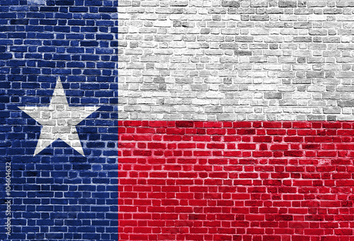 Texas US flag painted on old vintage brick wall
