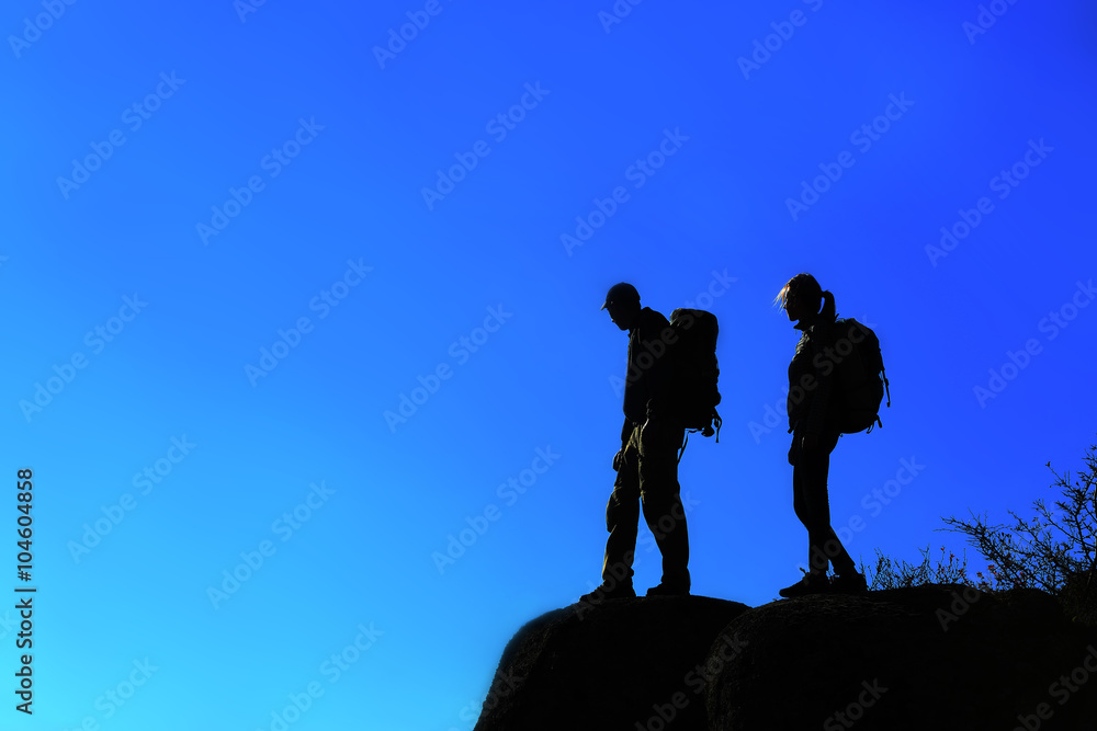 Man and woman on the top of the mountain