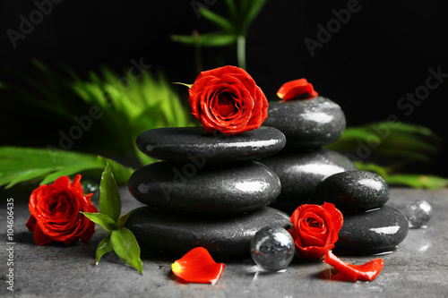 Beautiful spa composition with roses and stones