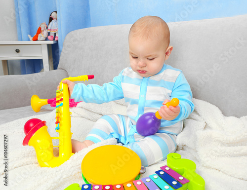 Adorable baby with colourfu...