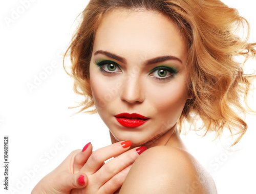 Beautiful girl with colorful makeup and manicure, isolated on white
