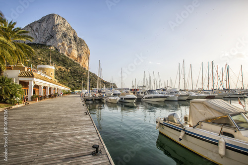 Calpe Alicante marina boats with Penon de Ifach mountain. photo