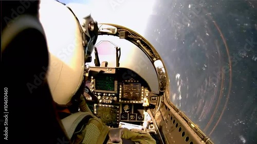 POV shots from the cockpit of a fighter plane. photo