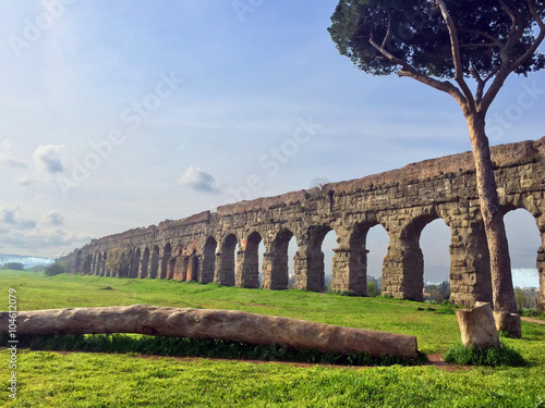 Fotografie Roman aqueduct in Italy ancient stone structure - landscape color photo