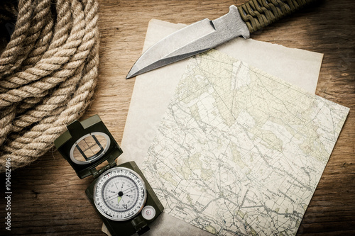 Map, compass, knife and rope