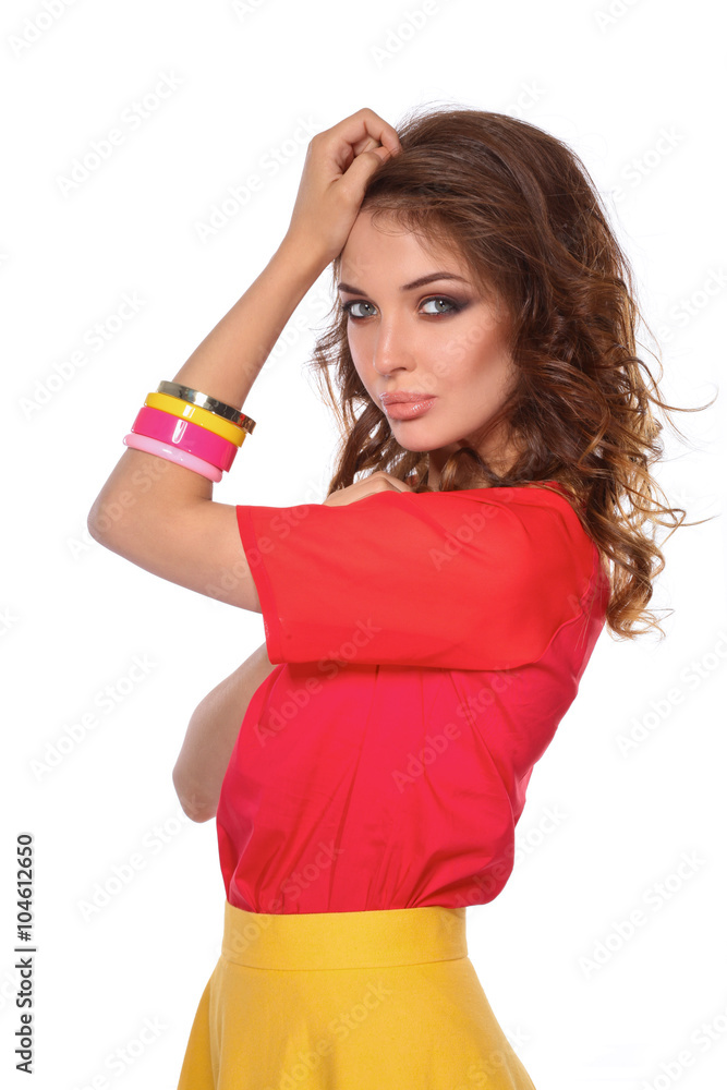 Beautiful woman with curly hair wearing a red jacket, isolated on white background Beautiful woman with curly hair wearing a red jacket, isolated on white background