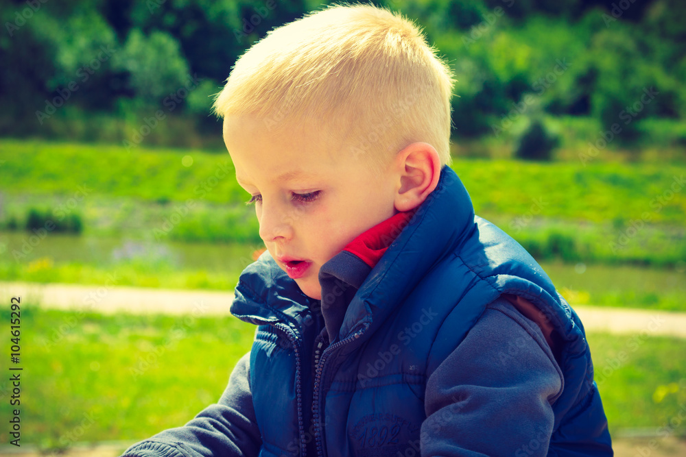 Pensive boy child thinking and daydreaming. Pensive boy child thinking and daydreaming.
