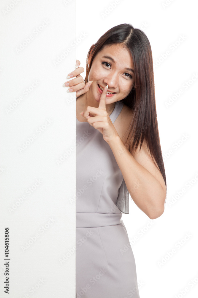 Beautiful young Asian woman do quiet sign with blank sign Beautiful young Asian woman do quiet sign with blank sign
