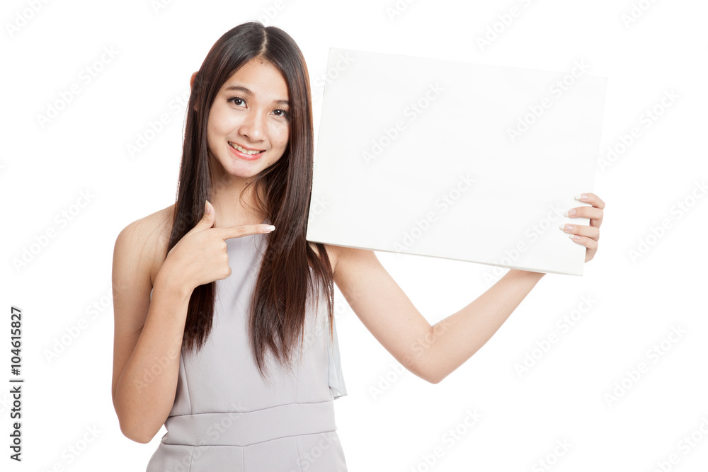 Beautiful young Asian woman point to blank sign Beautiful young Asian woman point to blank sign