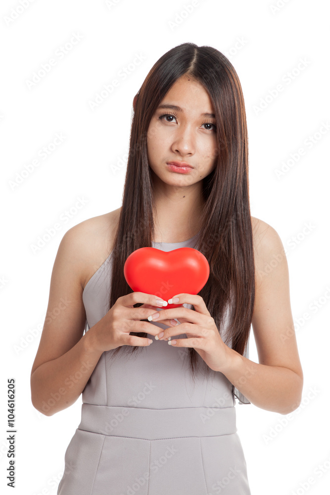 Beautiful young Asian woman with red heart Beautiful young Asian woman with red heart