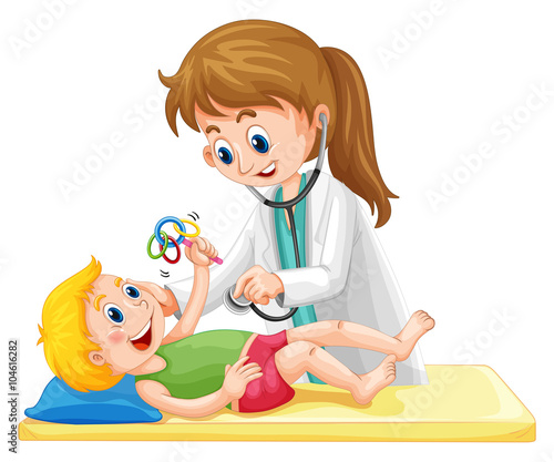 Doctor examining toddler boy