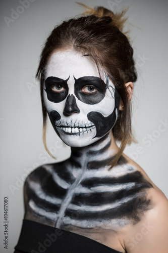 Woman painted like a zombie