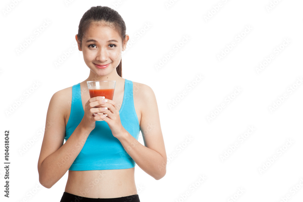 Beautiful healthy Asian girl with tomato juice Beautiful healthy Asian girl with tomato juice