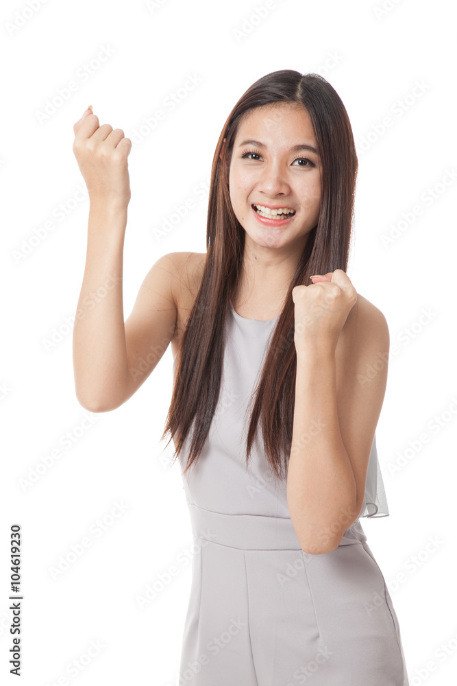 Happy Beautiful young Asian woman with both fist up Happy Beautiful young Asian woman with both fist up