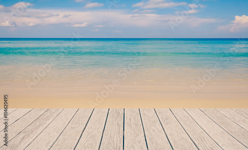 wooden floor with beautiful ocean and blue sky