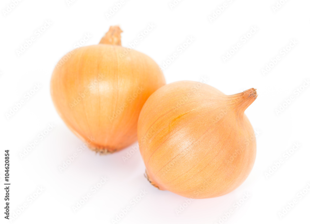 Small gold onion isolated on white background