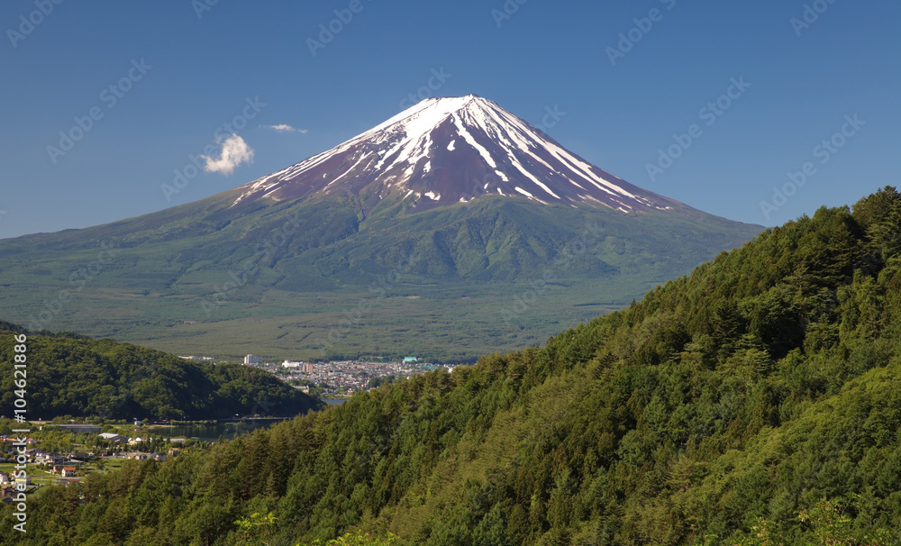 Mountain Fuji and Fujiyoshi town in summer season Mountain Fuji and Fujiyoshi town in summer season