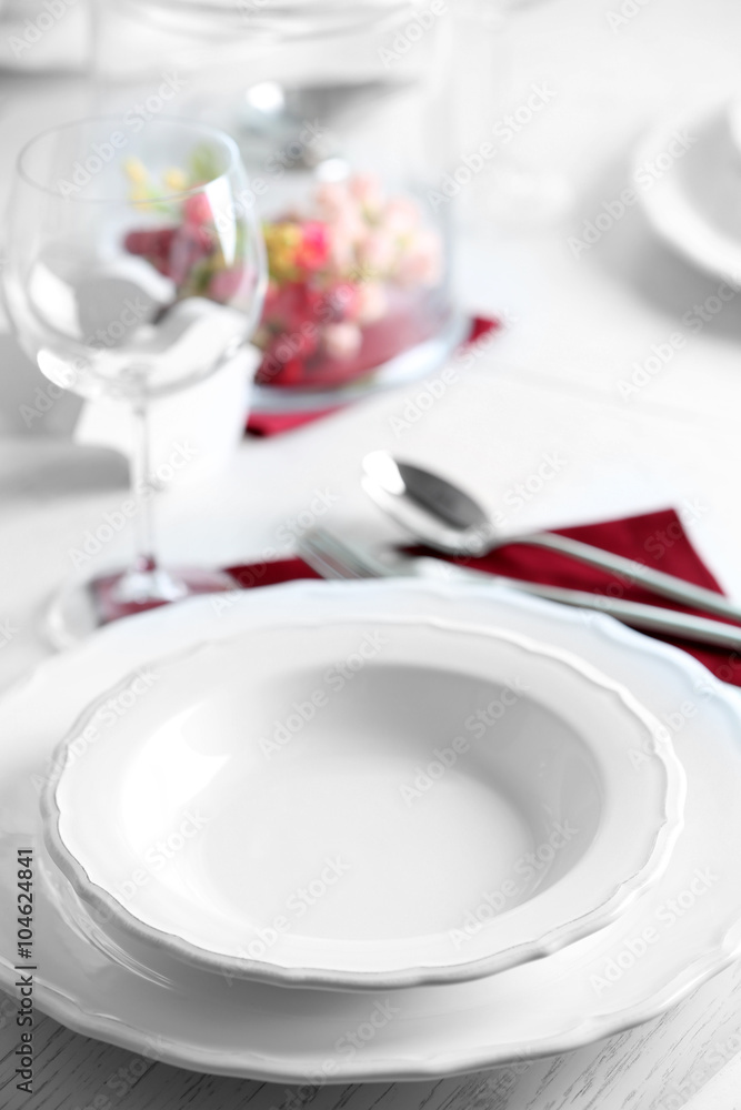 Table set at restaurant on light background Table set at restaurant on light background
