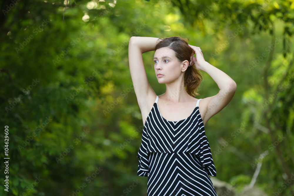 Caucasian girl relaxing and enjoying life in forest's fresh air Caucasian girl relaxing and enjoying life in forest's fresh air