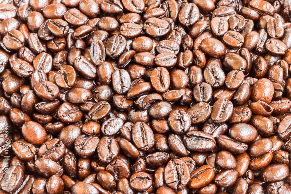 Brown roasted coffee beans , texture background Brown roasted coffee beans , texture background