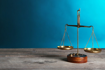 Justice scales on blue background