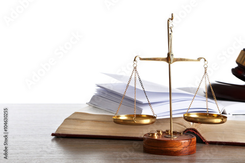 Wooden gavel with justice scales and open books on white background