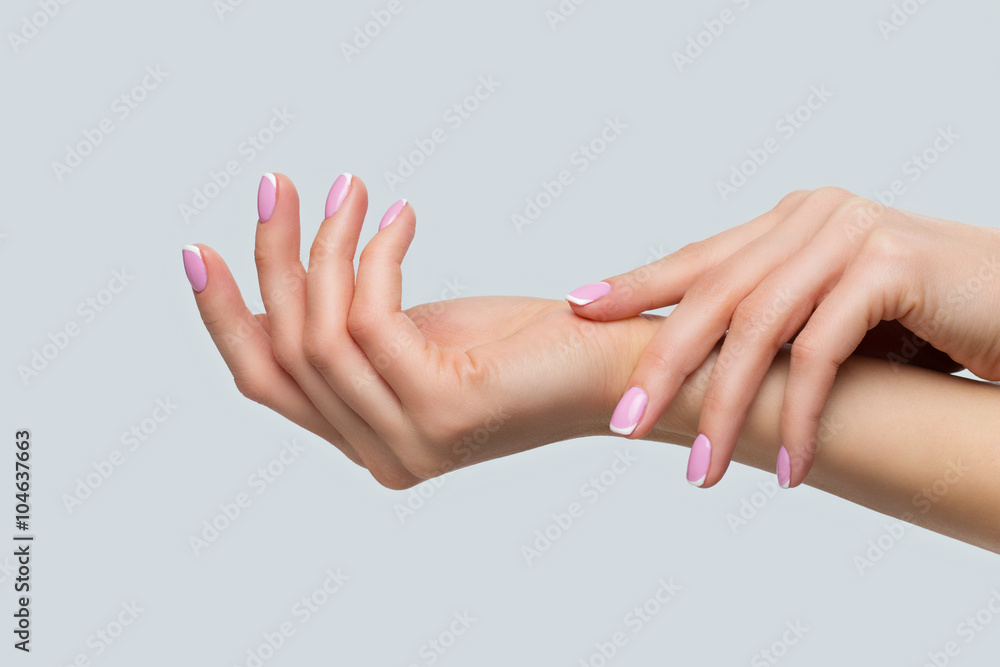 Woman hands with french manicure