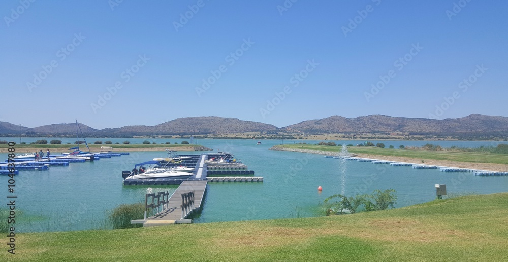 Boat jetties at the Caribbean Beach Club at Hartbeespoort Dam in the