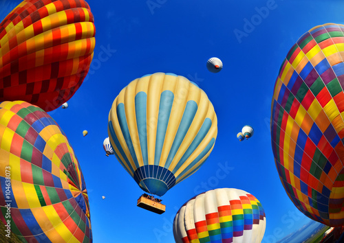 Colorful hot air balloon flying  in  blue sky  at Cappadocia ,Turkey 