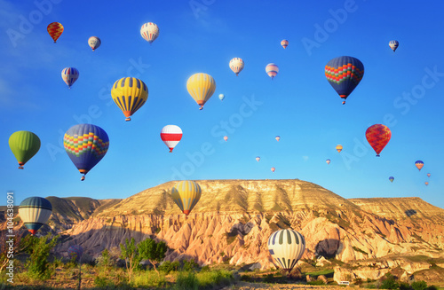 Colorful hot air balloon flying in blue sky at Cappadocia ,Turkey 