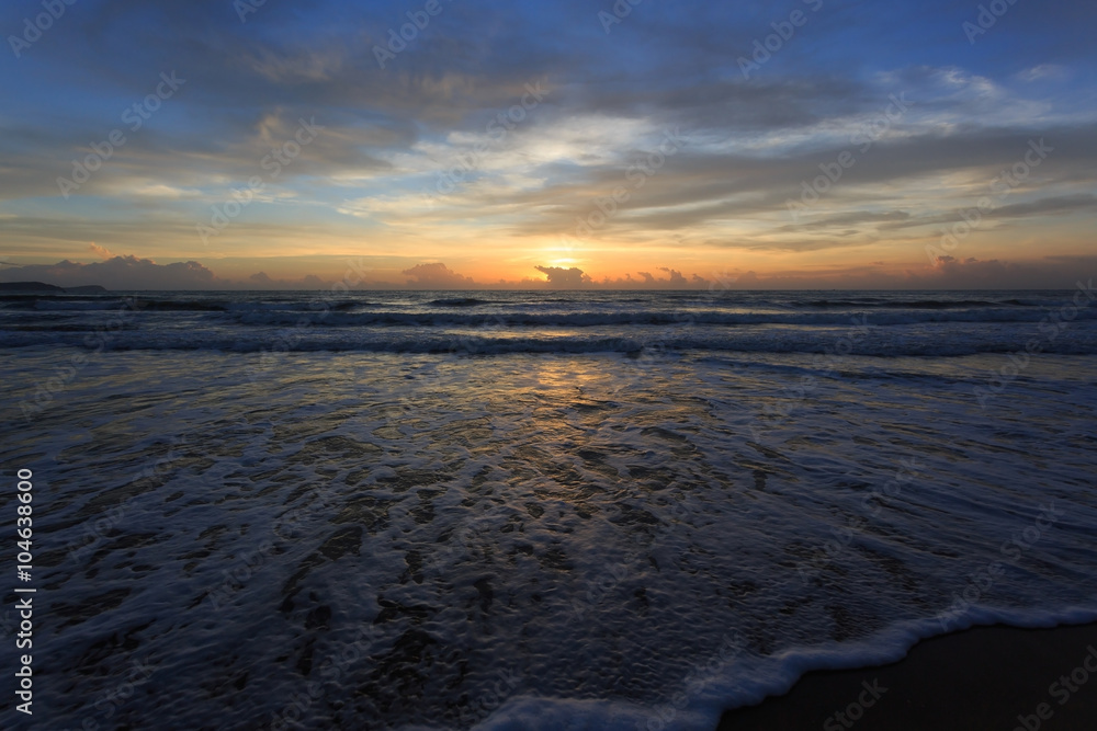 sunset dramatic sky with colorful cloud on the beach