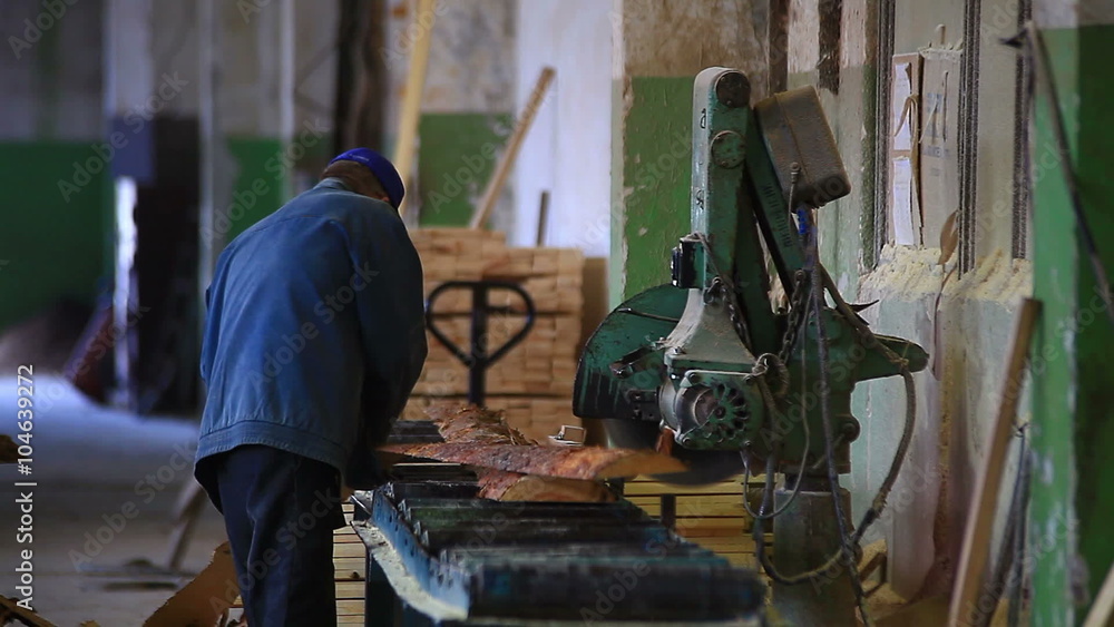 worker saws board the machine video worker saws board the machine video