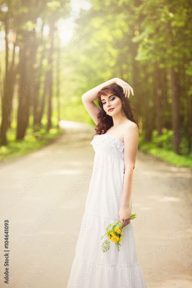 Girl outdoors with flowers