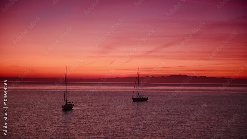 Romantic pink scene with sea boats floating on the water, natural calm holiday background. HD quality Romantic pink scene with sea boats floating on the water, natural calm holiday background. HD quality