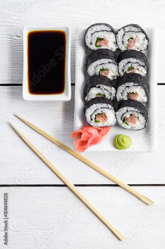 Sushi and roll with cream cheese and salmon fish inside