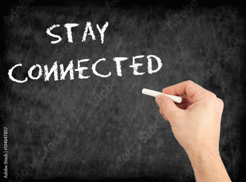 Stay Connected - hand writing text on chalkboard