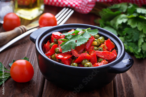 Vegetarian ragout with tomato and peas