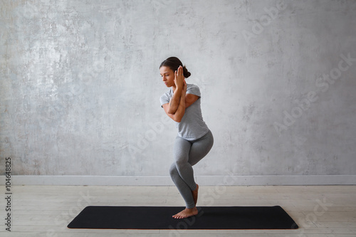 Woman practicing advanced yoga. A series of yoga poses